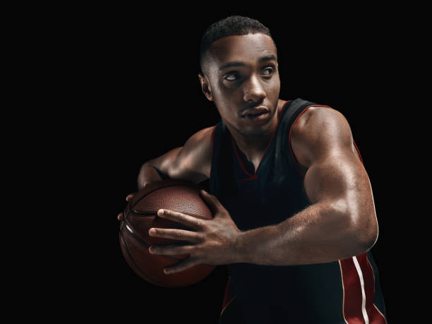 istock The african man basketball player standing with ball 856312338