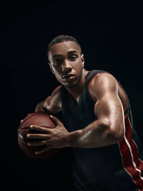 istock The african man basketball player standing with ball 856312418