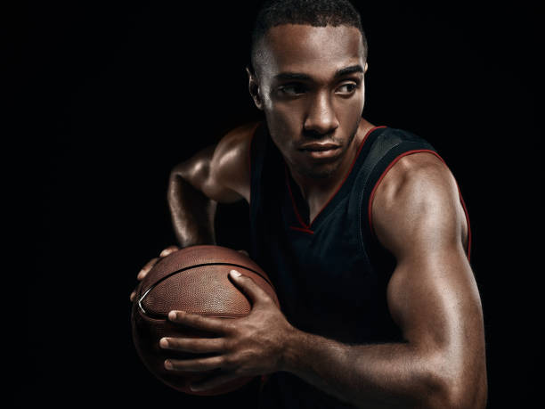 istock The african man basketball player standing with ball 856312528