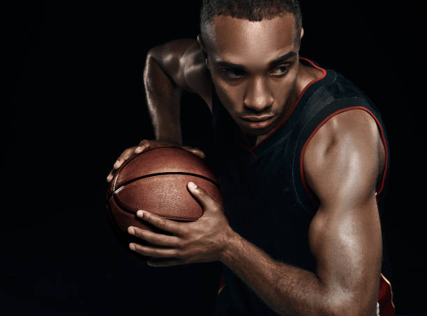 istock The african man basketball player standing with ball 856312662