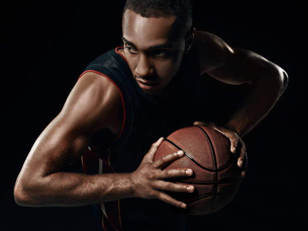 istock The african man basketball player standing with ball 856314710
