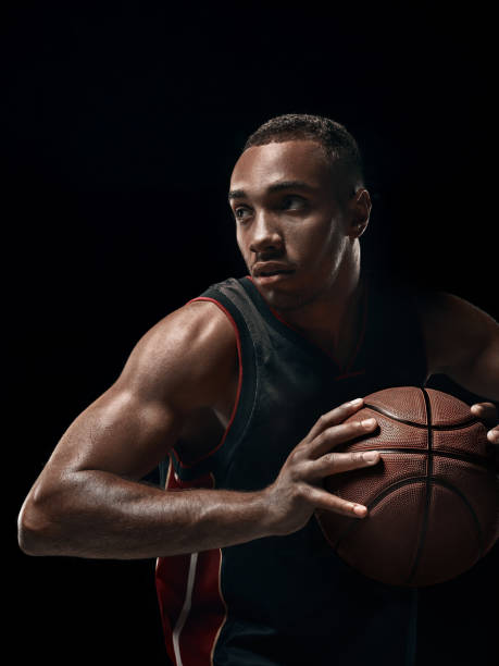 istock The african man basketball player standing with ball 856314788