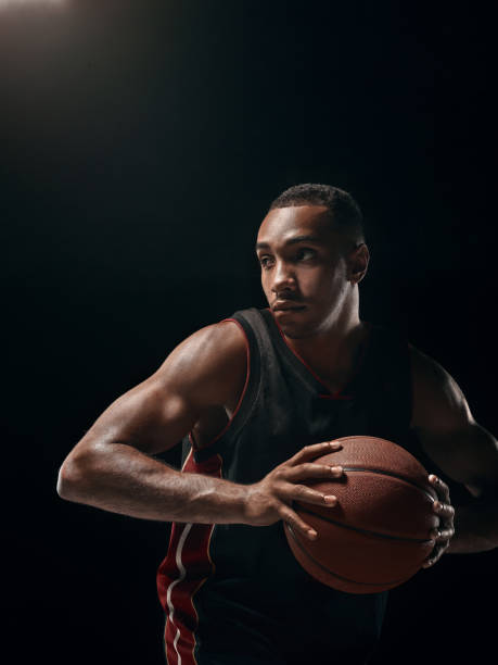 istock The african man basketball player standing with ball 856314876