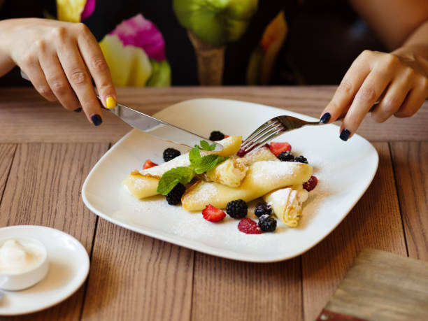 istock Breakfast pancakes. A plate of creamy pancakes with berries on a 856314914