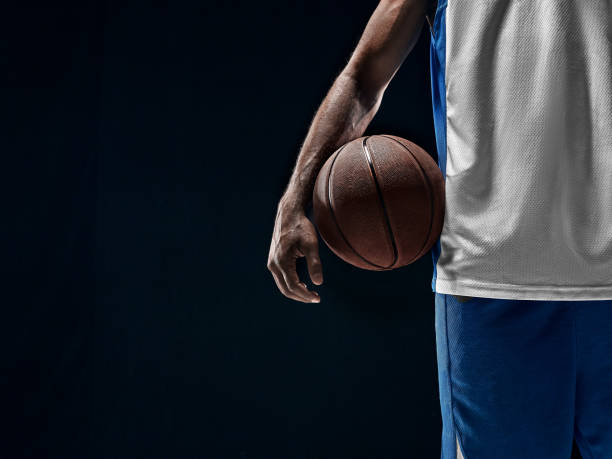 istock The african man basketball player standing with ball 856315384