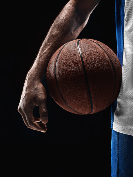 istock The african man basketball player standing with ball 856317498