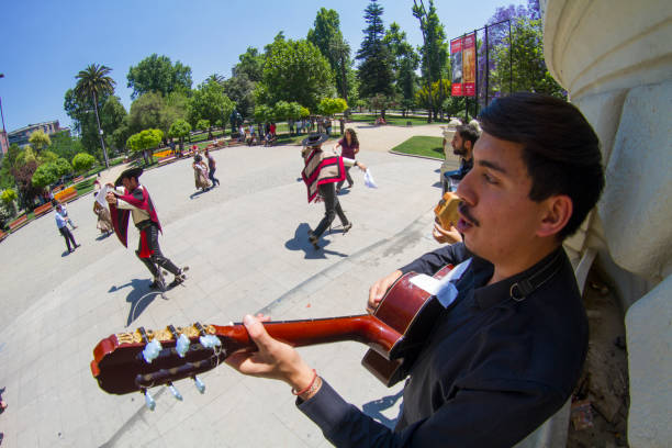 Santiago de Chile, Chile - September 18, 2017: 'Cueca' Chilean typical dance. Here the musician performance in a National day on Chile at Parque Forestal, Santiago's downtown.