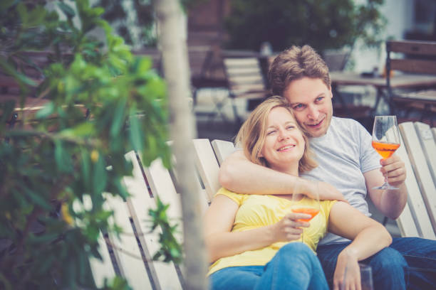 istock Couple drinking cocktail outdoors 856317706