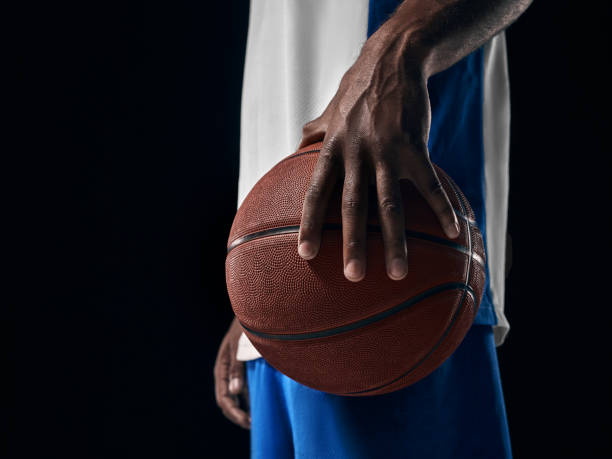istock The african man basketball player standing with ball 856317836