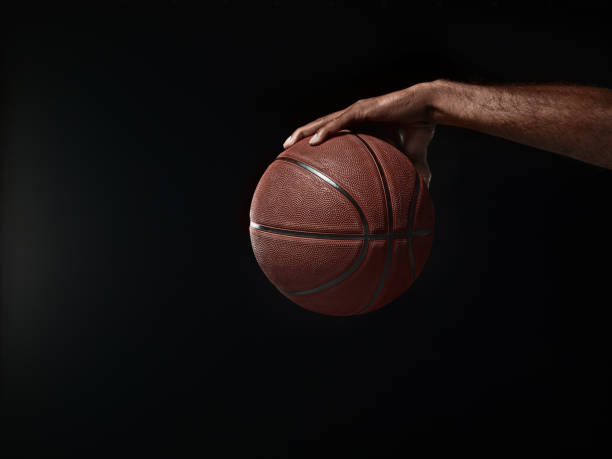 istock The african man basketball player standing with ball 856317898