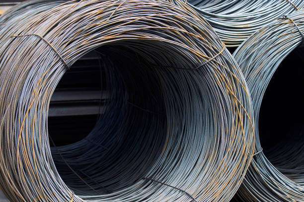 istock Thin metal reinforcement wound into bays at the metal products warehouse 856317996