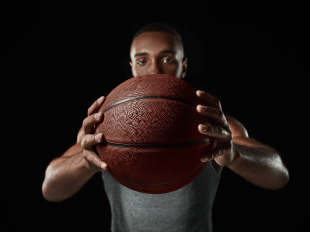 istock The african man basketball player standing with ball 856318170