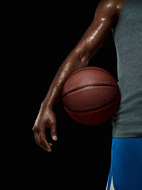 istock The african man basketball player standing with ball 856318338