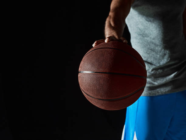 istock The african man basketball player standing with ball 856318606