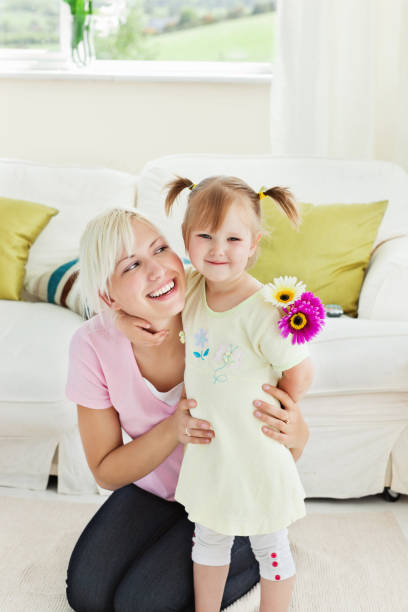 istock Blond woman get surprise by her daughter 856321256