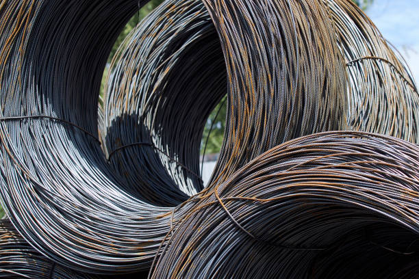 istock Thin metal reinforcement wound into bays at the metal products warehouse 856324684