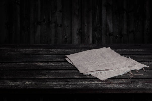 istock Dark wooden table for product, old black wooden perspective interior 856325076