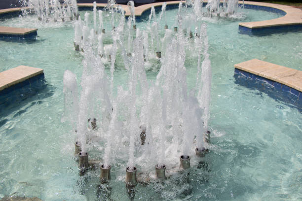 istock The fountains gushing sparkling water in a pool 856332566