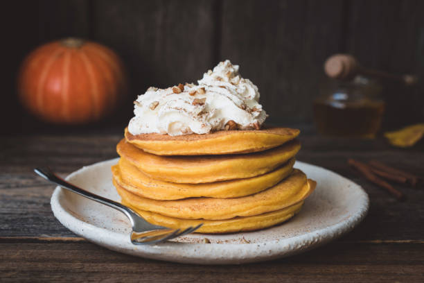 istock Pumpin pancakes with whipped cream and nuts 856342050