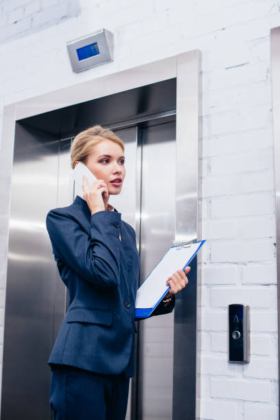 istock businesswoman talking by phone 856342100