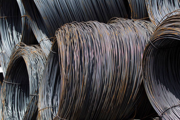 istock Thin metal reinforcement wound into bays at the metal products warehouse 856345358