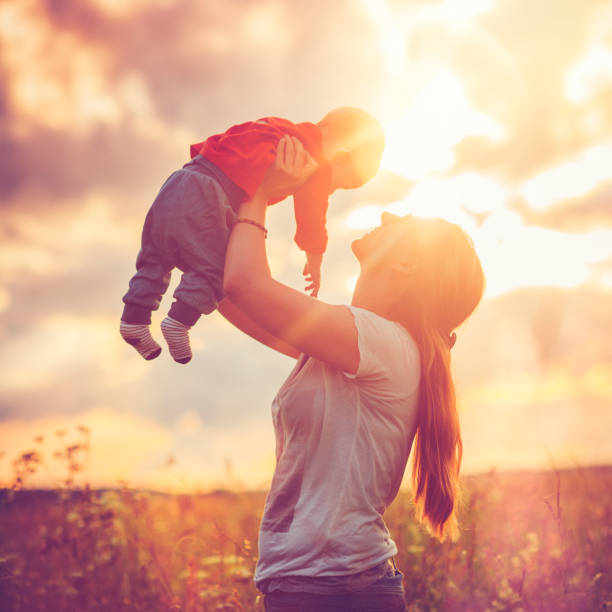 istock Happy family in sunset 856359272
