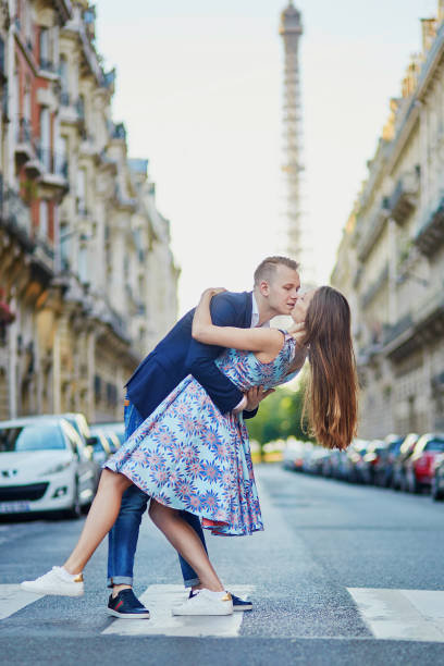 istock Romantic couple near the Eiffel tower in Paris 856366314