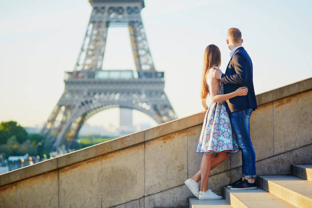 istock Romantic couple near the Eiffel tower in Paris 856366404