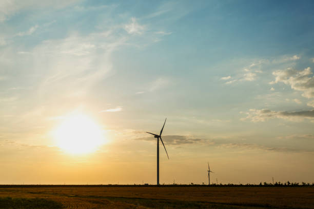 istock Electric windmill on a sunset background. Alternative energy. Innovative energy producing and manufacturing. Copy space. 856382604