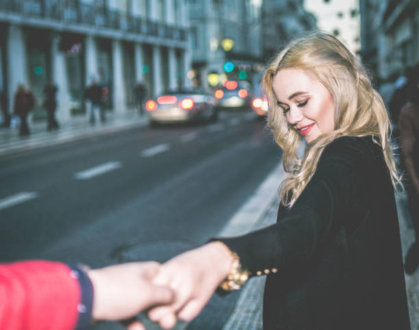 istock Couple Holding hands on the street 856382682