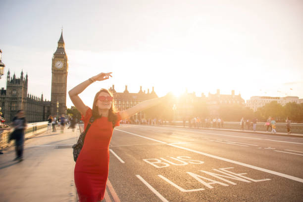 istock Happy woman in London 856389610