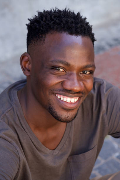 istock Close up cheerful young african man smiling 856406874
