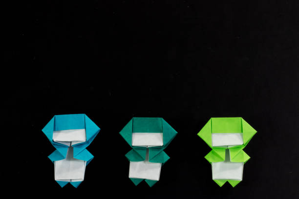 The Handmade Origami Ninja Kids on the Black Background