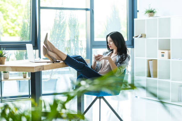 istock businesswoman at workplace with laptop 856407012