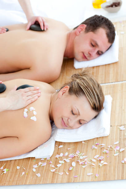 istock Relaxed young couple enjoying a stone therapy 856407222