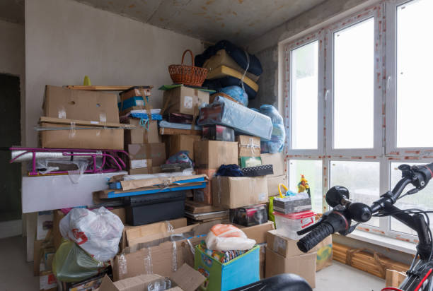 istock Moving to the apartment a new building, boxes and personal items against the background of concrete walls 856427626