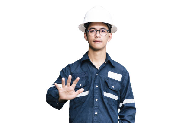 istock Engineer or Technician in white helmet, glasses and blue working shirt suit with hand sign, isolated on white, Electricity and Oil and Gas industrial concept with clipping path. 856427786
