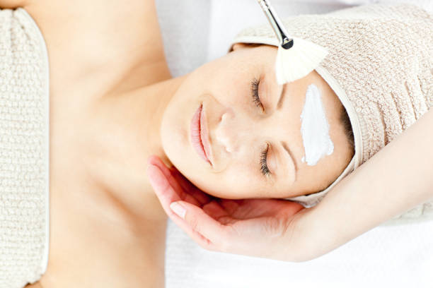 istock Beautiful relaxed woman receiving a beauty treatment 856438882