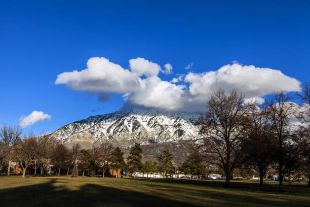 Utah County As winter sets in, snow inches its way down the mountains until the valley floor is sufficiently frozen to receive the white covering over it as well. spanish fork utah stock pictures, royalty-free photos & images