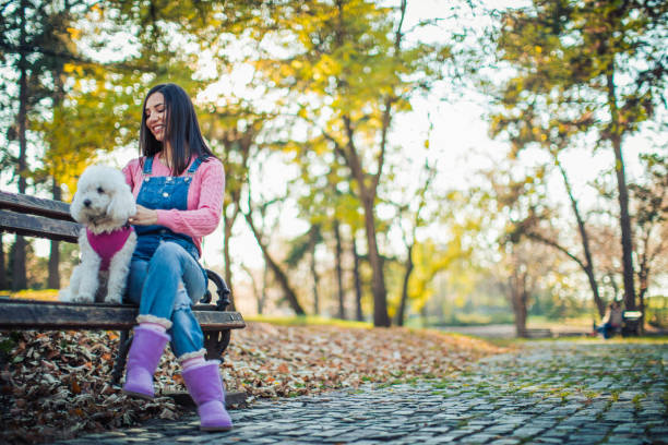 istock Beautiful girl with dog 856447516