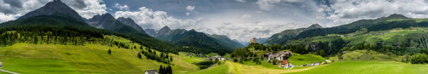 panorama view of the lower engadin and tarasp - castle engadine alps lake water imagens e fotografias de stock