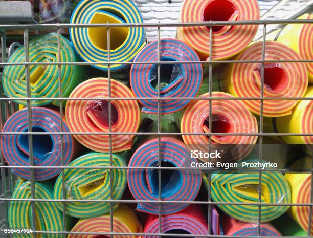 Multicolored Yoga Mats In Store Stock Photo - Download Image Now - Choice, Rug, Store