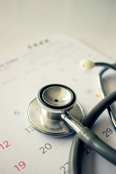 istock annual checkup concept. stethoscope on the calendar with soft-focus and over light in the background 856484176