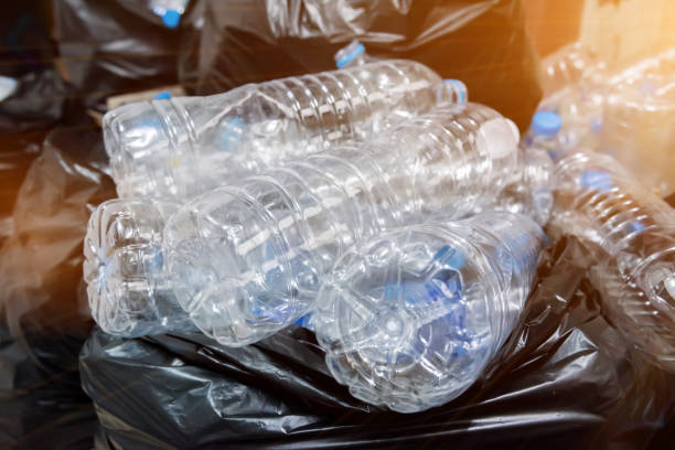 istock Plastic bottles in black garbage bags waiting to be taken to recycle. 856488858
