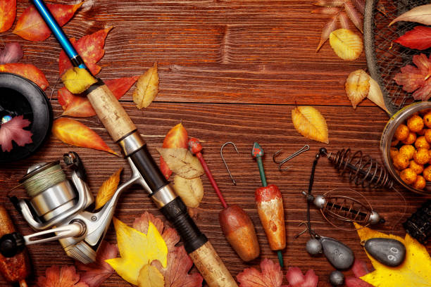 istock Fishing tackle on vintage wooden 856496038