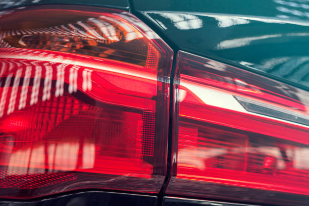 istock headlights under the reflection of lights 856500808