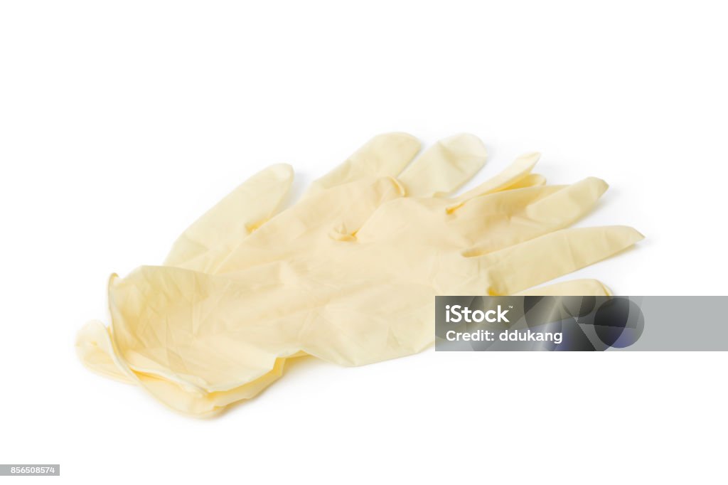 Yellow protection medical or cleaning gloves on white background. Medical supplies, Glove, Protective glove, Laboratory, Yellow glove, Cut out Accidents and Disasters Stock Photo