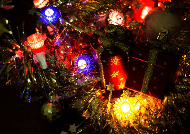 istock Christmas lights on a dark background. Place for the inscription. 856514744