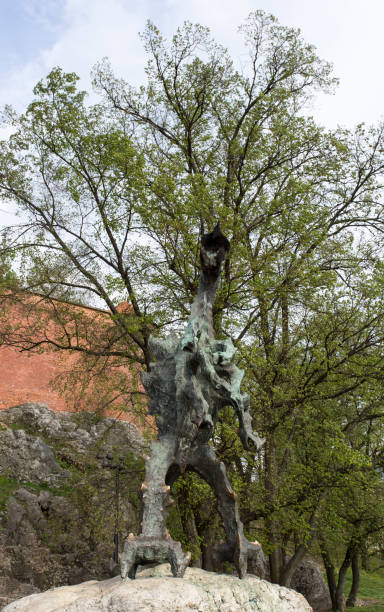 Austria, carinthia, Klagenfurt. The Lindwurm fountain, representing the Lindwurm dragon, about to be slayed by Hercules, is located in the center of Klagenfurt, on the Neuer Platz. The Lindwurm sculpture hails from the 16th century, the Hercules figure was added in the 17th century.
