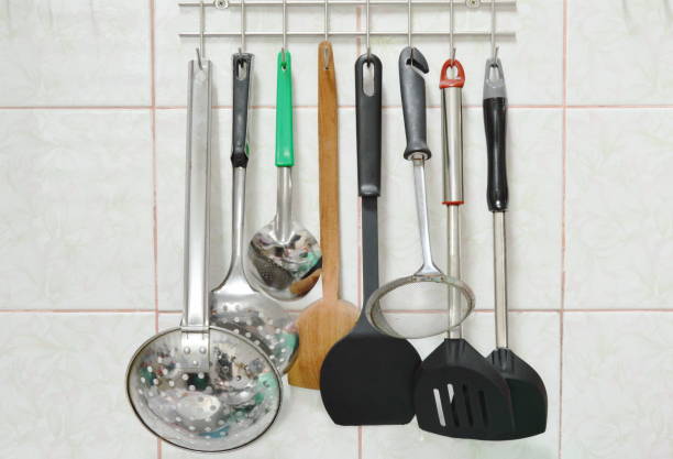 istock ladle flipper and colander with other kitchenware mobile on stainless hanger 856534240